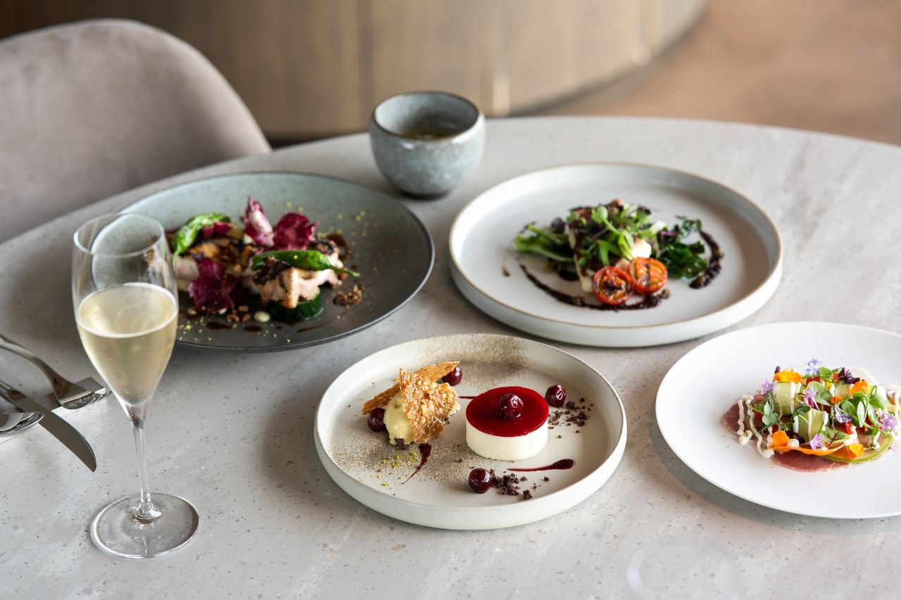 A selection of gourmet dishes beautifully presented in a Tokyo restaurant.